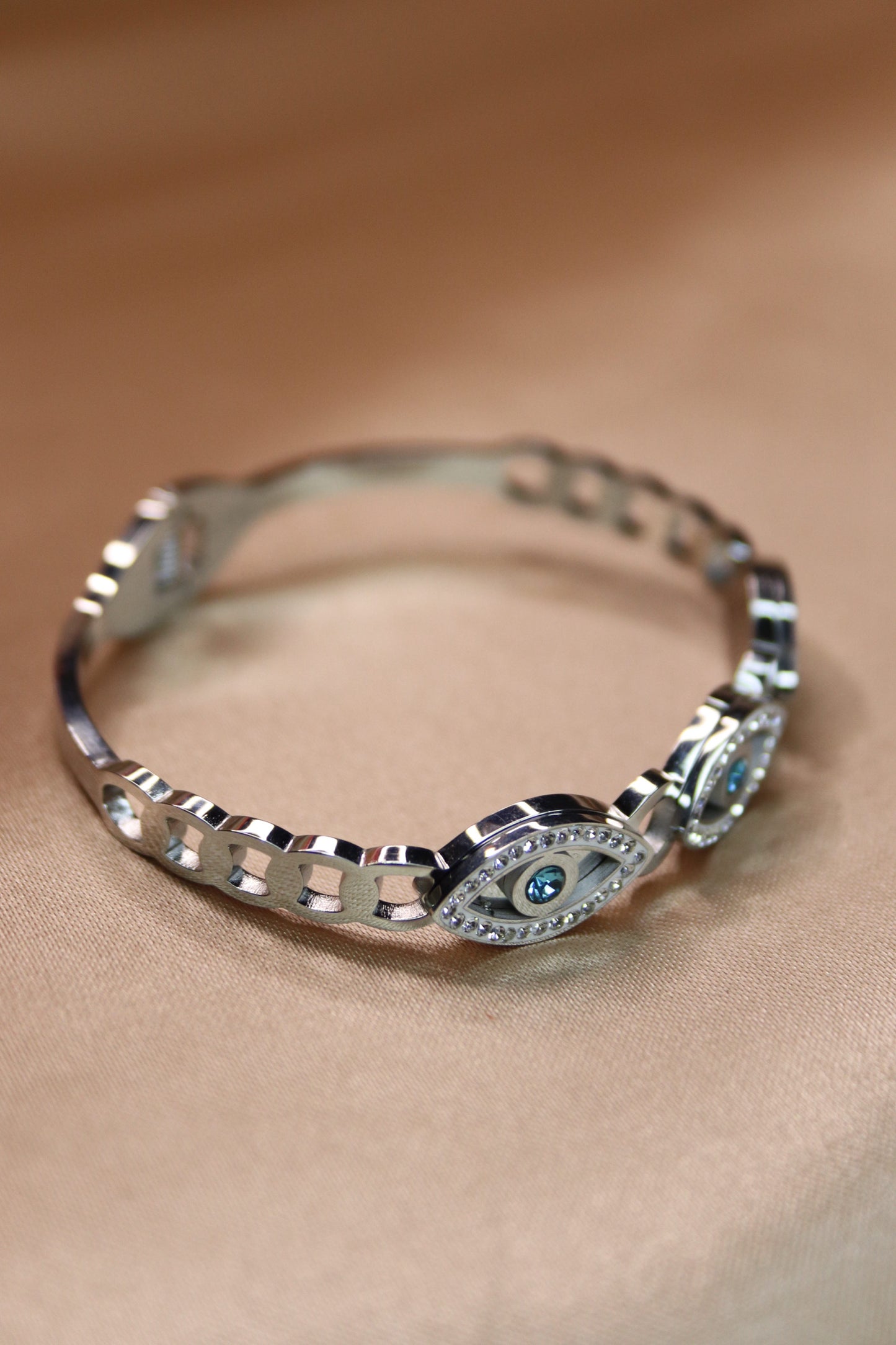 Bracciale con occhi stilizzati